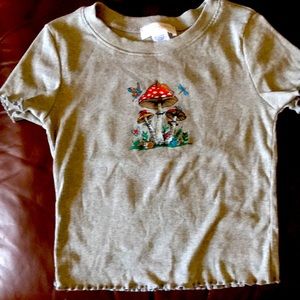 Girls mushroom t shirt never worn.